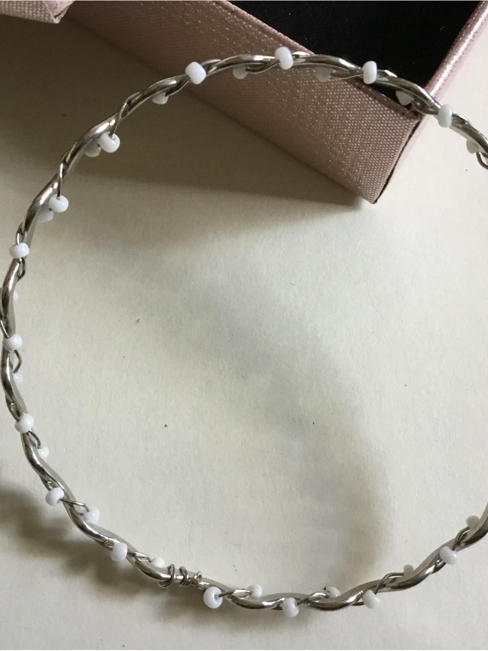 Twisted Silver Wire Bracelet with White Bead Accents